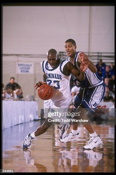 Forward Roshown McLeod of the Duke Blue Devils chases after Darnell Clavon of Chaminade during a game at the Maui Invitational at the Lahaina Civic...