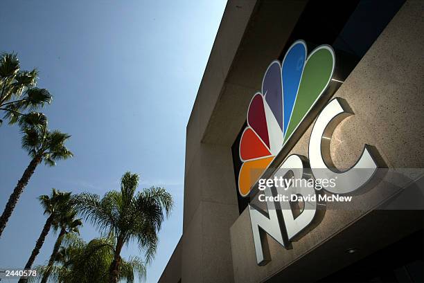 The NBC peacock logo is seen on the NBC studios building August 28, 2003 in Burbank, California. Paris-based Vivendi is in the final stages of a long...