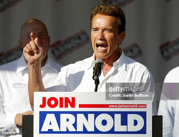 Republican candidate for governor, actor Arnold Schwarzeneger speaks at a shopping center rally August 28, 2003 in Fresno, California....