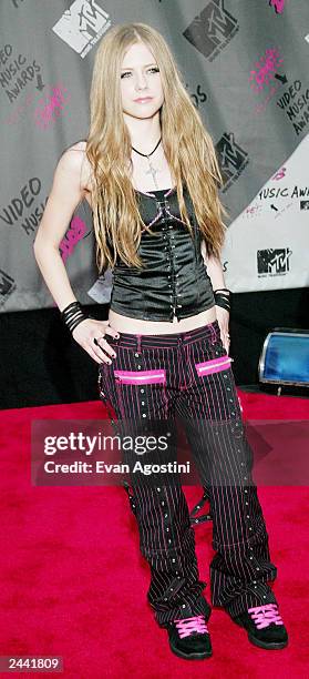 Singer Avril Lavigne arrives to the 2003 MTV Video Music Awards at Radio City Music Hall on August 28, 2003 in New York City.