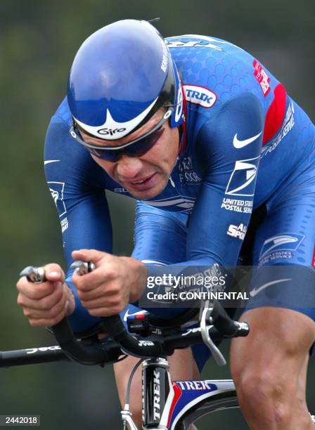 Olympic Russian time trial champion Viatcheslav Ekimov, 21 August 2003 on his way to clock the fastest time, in the Enecotour . Ekimov was the...