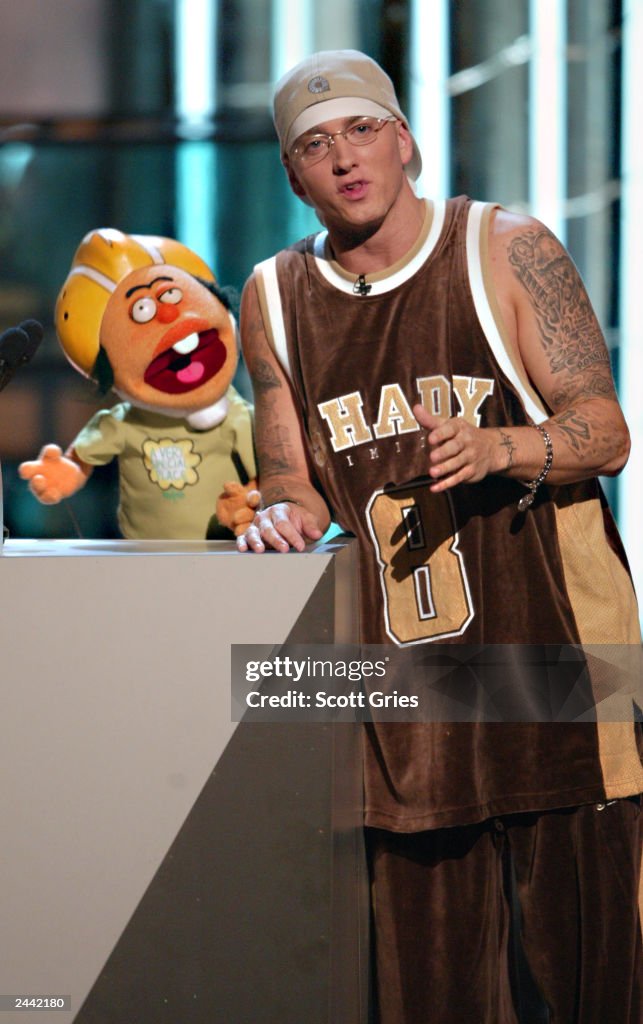 Singer Eminem speaks onstage during the 2003 MTV Video Music Awards