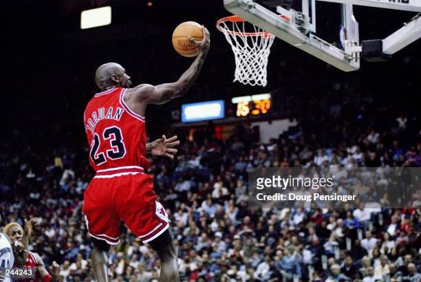 Guard Michael Jordan of the Chicago Bulls jumps to the basket during a game against the Washington Wizards at the US Airways Arena in Landover,...