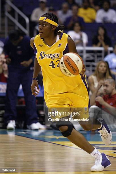 Nikki Teasley of the Los Angeles Sparks drives upcourt during the game against the Houston Comets on August 25, 2003 at Staples Center in Los...