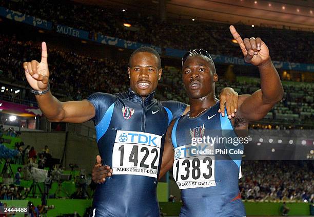 John Capel and Darvis Patton of the USA celebrate after winning gold and silver respectively in the men's 200m final at the 9th IAAF World Athletics...