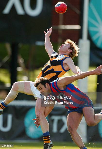 Gary Moorcroft for the Zebras flys over Anthony Aloi for the Borough during the VFL match between the Port Melbourne Borough and the Sandringham...