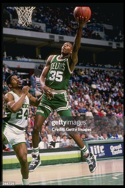 Reggie Lewis 32 Reggie Lewis Basketball Player Stock Photos, High-Res Pictures, and ...