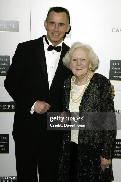 British television chef Gary Rhodes and Dame Marguerite Patten OBE attend "The Tio Pepe Carlton London Restaurant Awards 2003" at the Great Room, Le...