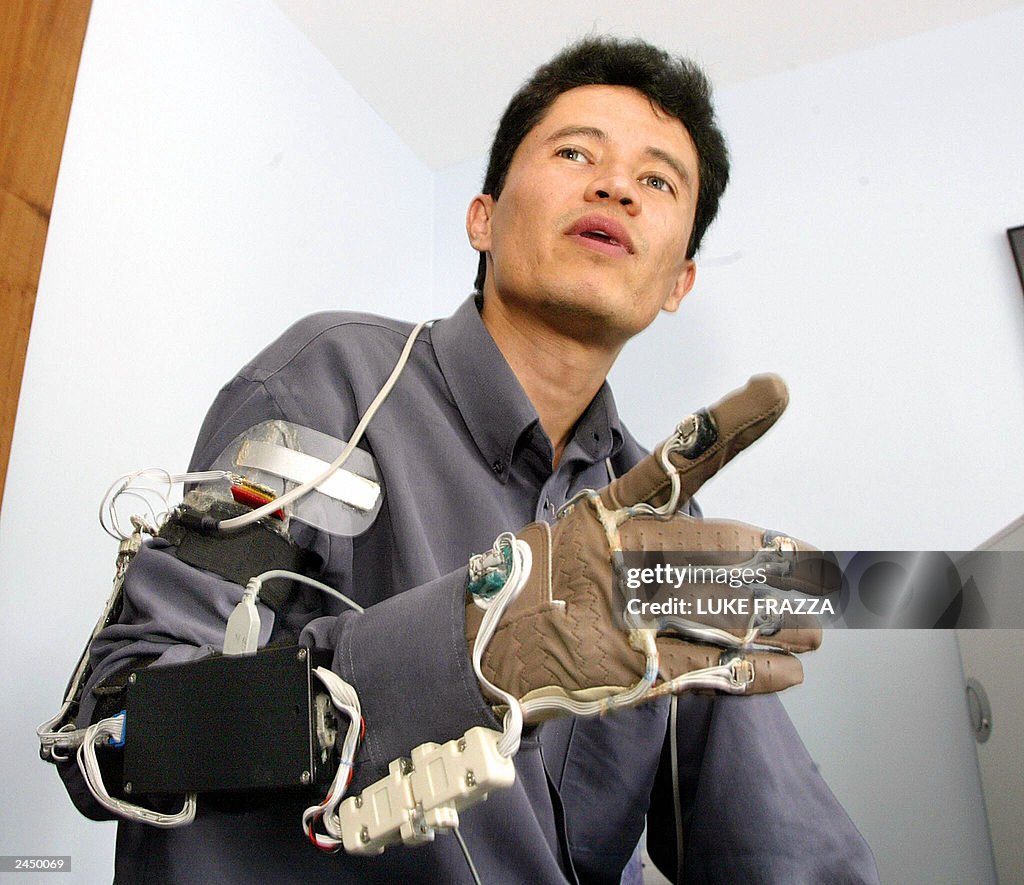Researcher Jose HernandezRebollar demonstrates his