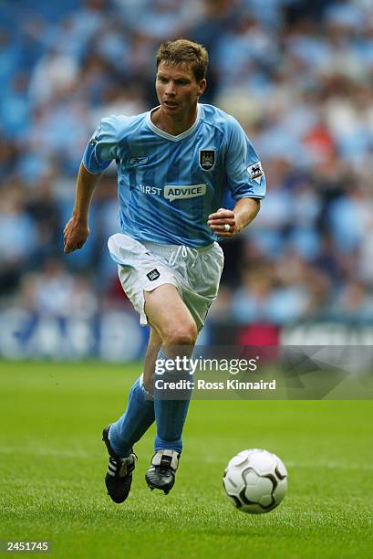 Michael Tarnat of Manchester City charges forward during the FA Barclaycard Premiership match between Manchester City and Portsmouth held on August...