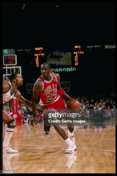 Guard Michael Jordan of the Chicago Bulls in action during a game against the Denver Nuggets at the McNichols Sports Arena in Denver, Colorado.