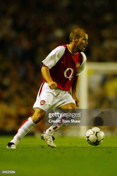 Freddie Ljungberg of Arsenal running with the ball during the FA Barclaycard Premiership match between Arsenal and Aston Villa on August 27, 2003 at...