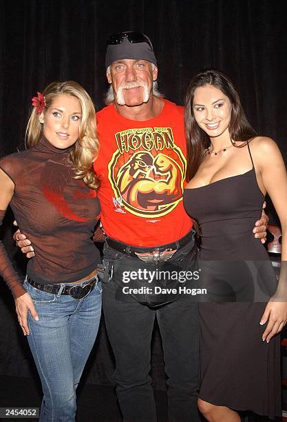 American WWF superstars "Hulk Hogan" and the "Miller Lite Catfight Girls" Tanya Ballinger and Kitana Baker attend the press conference for...