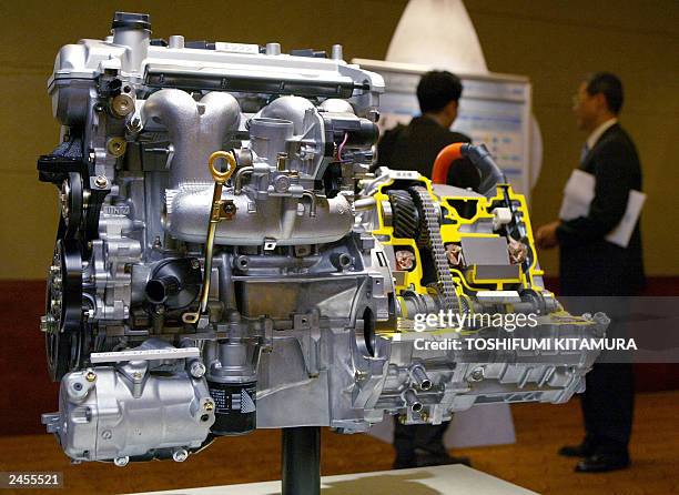 Toyota Motors' next-generation Toyota Hybrid System engine is displayed at the press preview of the all-new Prius at a Tokyo hotel, 01 September...