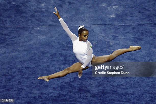 Daiane Dos Santos of Brazil competes in the women's floor exercise during the Apparatus Finals of the 2003 World Gymnastics Championships at the...