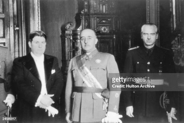 Spanish dictator General Francisco Franco with his brother in-law and Foreign Minister, Ramon Serrano Suner , and a Costa Rican minister, in Madrid,...