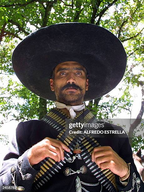 Mexican folk singer and actor Alejandro Fernandez portrayed as Emiliano Zapata, pose during the filming of the movie "Zapata" at the village of...