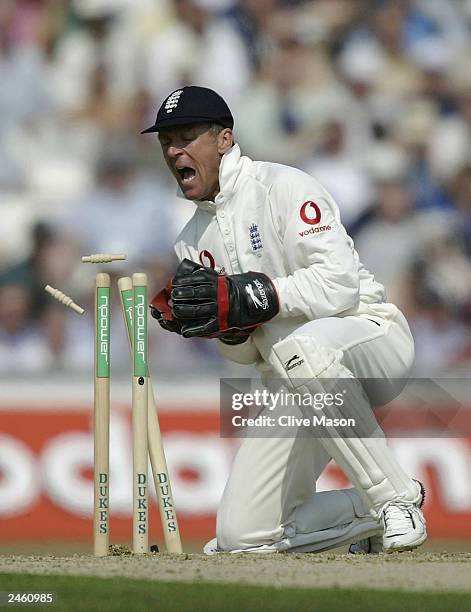 Alec Stewart of England runs out Graeme Smith of South Africa during the first day of the fifth npower test match between England and South Africa at...