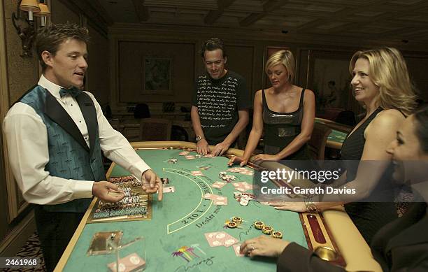 Entertainment Today Presenters Jackie Brambles, Jenni Falconer and Ben Shephard play on the high rollers tables at Mirage September 3, 2003 in Las...