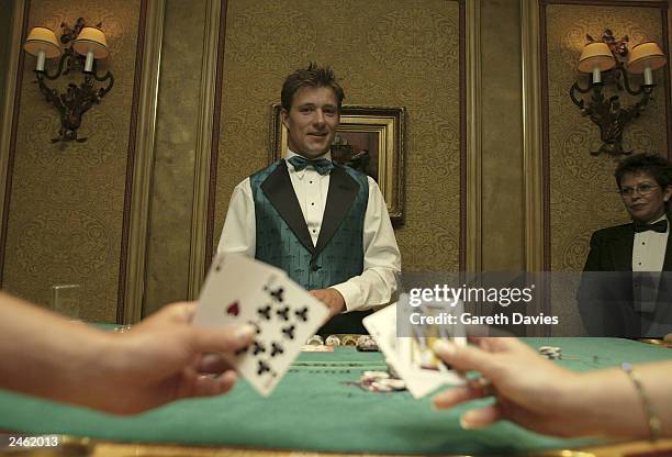 Entertainment Today Presenters Jackie Brambles, Jenni Falconer and Ben Shephard play on the high rollers tables at Mirage September 3, 2003 in Las...