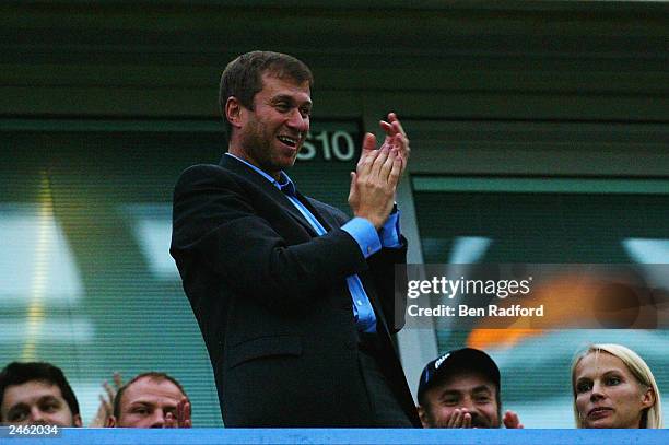 Chelsea owner Roman Abramovich cheers as the players come onto the pitch during the UEFA Champions League Third Round, second leg Qualifier match...