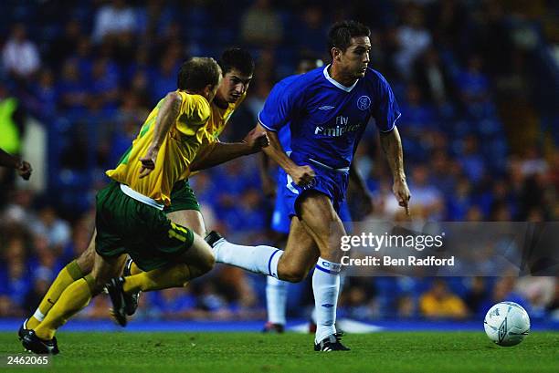 Frank Lampard of Chelsea races away from Miroslav Barcik of MSK Zilina during the UEFA Champions League Third Round, second leg Qualifier match...