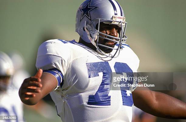 Defensive lineman Ed "Too Tall" Jones of the Dallas Cowboys celebrates a play during a 1985 NFL game against the Los Angeles Rams at Anaheim Stadium...