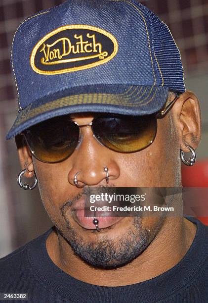 Former NBA basketball player Dennis Rodman attends the film premiere of "This Thing Of Ours" at the Laemmle's Fairfax theater July 23, 2003 in...
