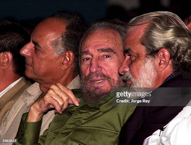 The Cuban president Fidel Castro attends a peformance of latin music at The Karl Marx Theatre on September 4, 2003 in Havana. Many nominees for...