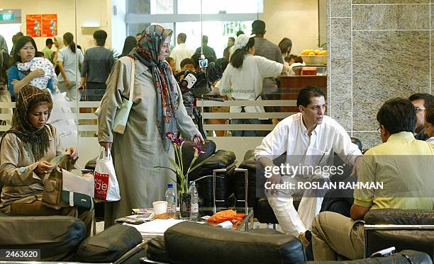 Group of Iranian wait at the lobby of Raffles Hospital for the update of the seperation of Iranian twin sisters Laden and Laleh Bijani in Singapore...