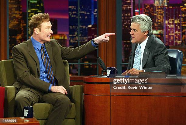 Talk show host Conan O'Brien appears on "The Tonight Show with Jay Leno" at the NBC Studios September 5, 2003 in Burbank, California.