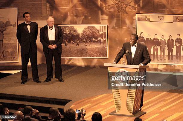 Meadowlark Lemon speaks after he is inducted into the Basketball Hall of Fame as Mannie Jackson, CEO of the Harlem Globetrotters, and David Gavitt,...