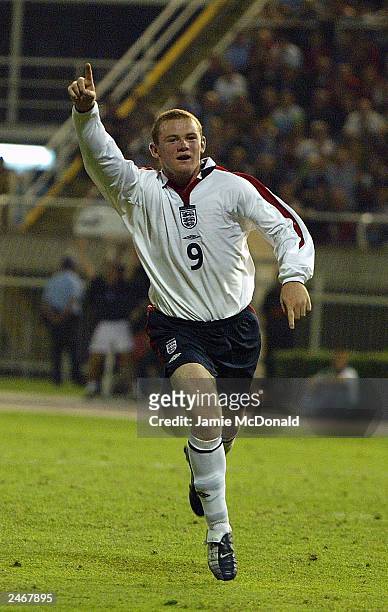 Wayne Rooney of England celebrates scoring a goal during the Euro 2004 qualifying match between Macedonia and England in the City Stadium on...