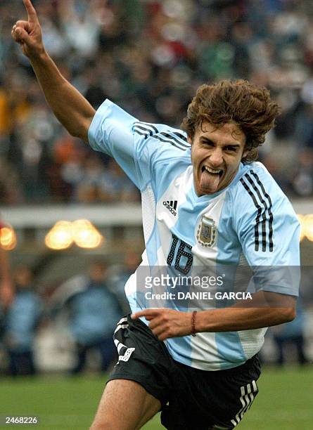 Argentinian Pablo Aimar celebrates after scoring the second goal against Chile 06 September 2003 at the Monumental stadium in Buenos Aires,...