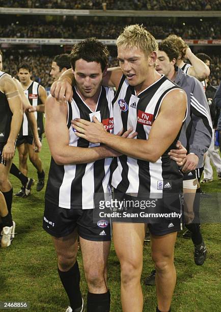 Alan Didak and Shane Woewodin for Collingwood celebrate winning the AFL second qualifying final between the Collingwood Magpies and Brisbane Lions at...