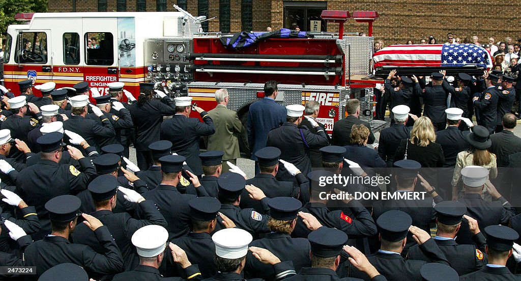 Mike Ragusa The casket of NYC fireman Michael Ragusa is is placed on a firetruck ...