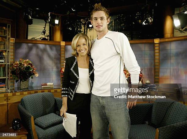 Open singles champion Andy Roddick meets Katie Couric September 8, 2003 while making an apperance on the Today show at th NBC studios in New York...