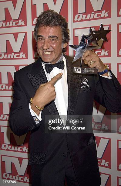 David Dickinson with his award for Best Lifestyle Show at the TV Quick awards at the Dorcester Hotel on September 8, 2003 in London.