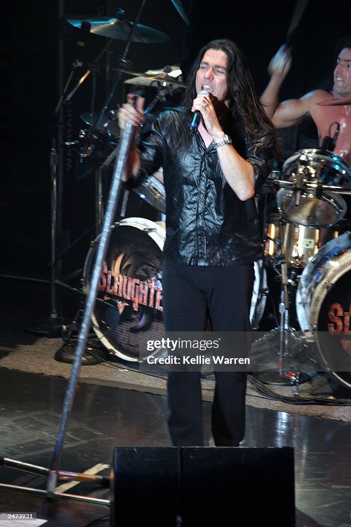 Mike Slaughter Singer Lead singer Mark Slaughter of Slaughter rocks out on their The Rock ...