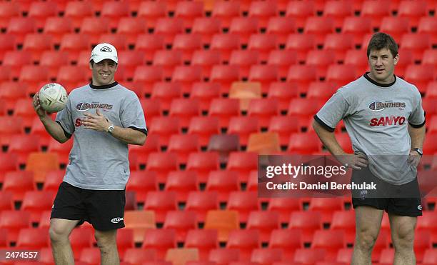 Luke Priddis and Martin Lang of the Panthers take it easy during the Penrith Panthers team training session held at Penrith Stadium September 9, 2003...