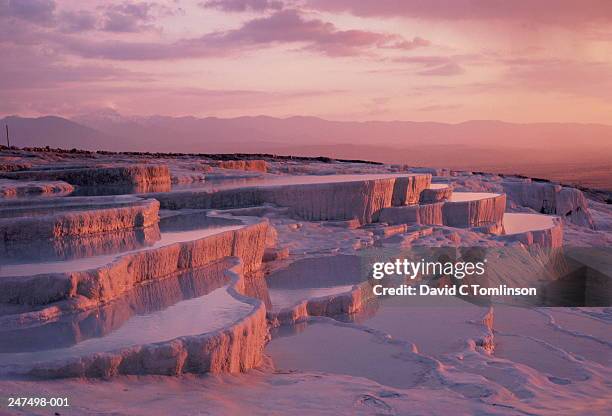 turkey,pamukkale,calcified limestone terraces at sunset - pamukkale stock pictures, royalty-free photos & images