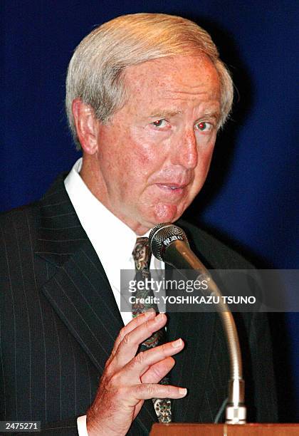 Auto parts giant Delphi President and CEO JT Battenberg III speaks before the press in Tokyo, 10 July 2003. The SARS crisis appears to have boosted...