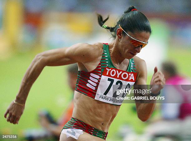 Ana Guevara of Mexico wins the women's 400m final 27 August 2003, during the 9th IAAF World Athletics Championships at the Stade de France in...