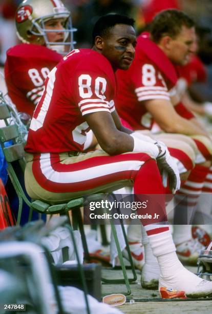 Wide receiver Jerry Rice of the San Francisco 49ers sits on the bench during a game against the Buffalo Bills at Candlestick Park in San Francisco,...