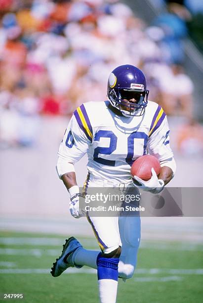 Running back Darrin Nelson of the Minnesota Vikings runs with the ball during a game against the Tampa Bay Buccaneers at Tampa Stadium in Tampa,...