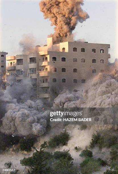 Detonated Building A residential building is detonated by the Israeli army in the... News ...