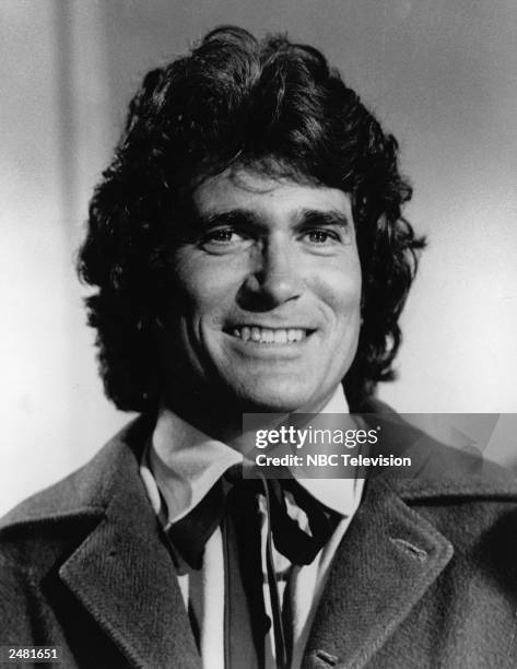 Headshot of American actor Michael Landon smiling in costume from the television series, 'The Little House On The Prairie,'