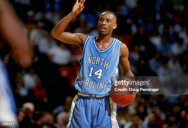 Derrick Phelps of the North Carolina Tar Heels dribbles the ball during a game against the Maryland Terrapins at the Cole Fieldhouse in College Park,...