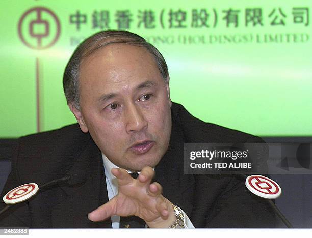 Anthony Neoh, convener of Bank of China special committee which investigated a problem loan extended to a Chinese property tycoon, gestures during a...