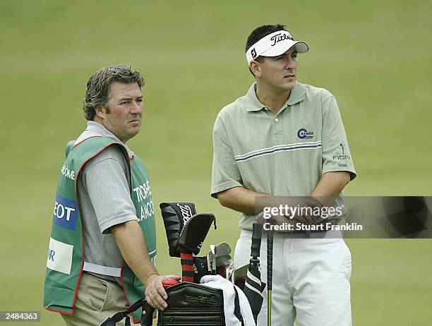 Caddie Andy Sutton and British Open Champion Ben Curtis of USA on the 8th hole during the first round of The Trophy Lancome on September 11, 2003 at...